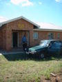 Lassy outside Hazyview teachers centre, holding omni for signal testing